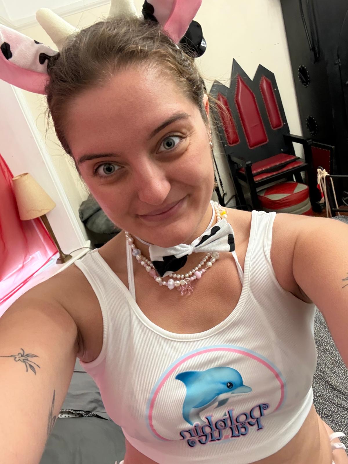 Tamsin Riley in Dolphin Parties crop top